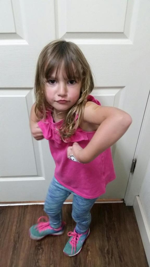 Boat kid shows off muscles after getting vaccines