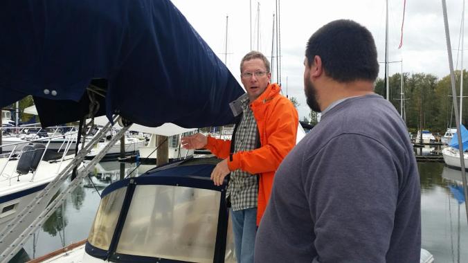 Jamie explains rigging a preventer on the boom aboard our sailboat Mosaic.