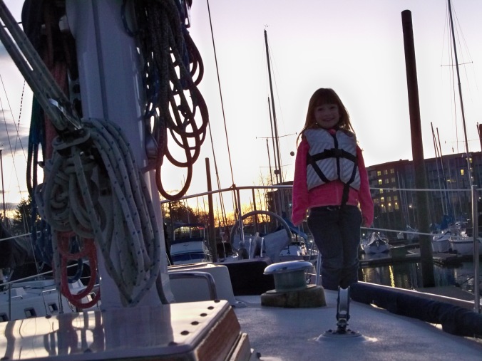 Kali hangs out on the foredeck one evening, enjoying a lovely March sunset