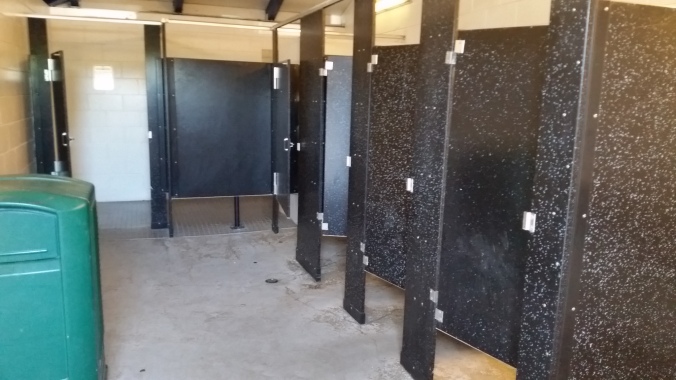 PUblic restroom with four stalls and a single shower stall each for men and women at the St. Helens Public Docks