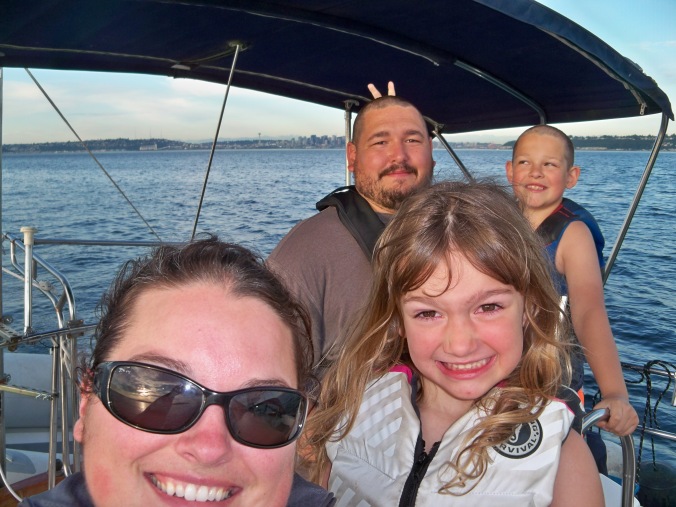 Family sailing from Seattle to Blake Island Marine State Park