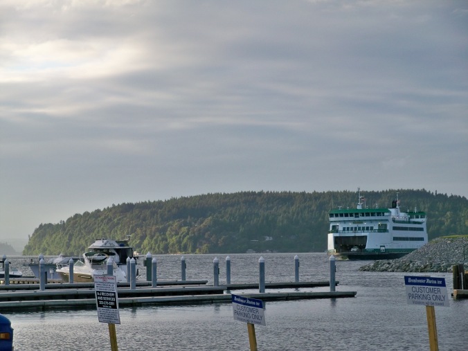 Washington State Ferry with Vashon Island in the background, docking at Tacoma