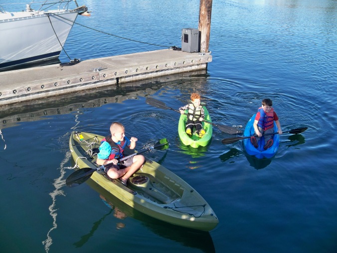 Kids of Fisherman Bay exploring on their kayaks